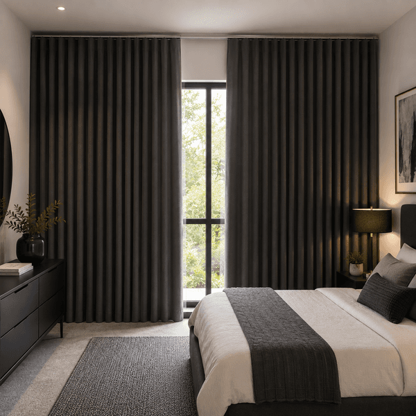 Elegant blockout curtains installed in a contemporary bedroom